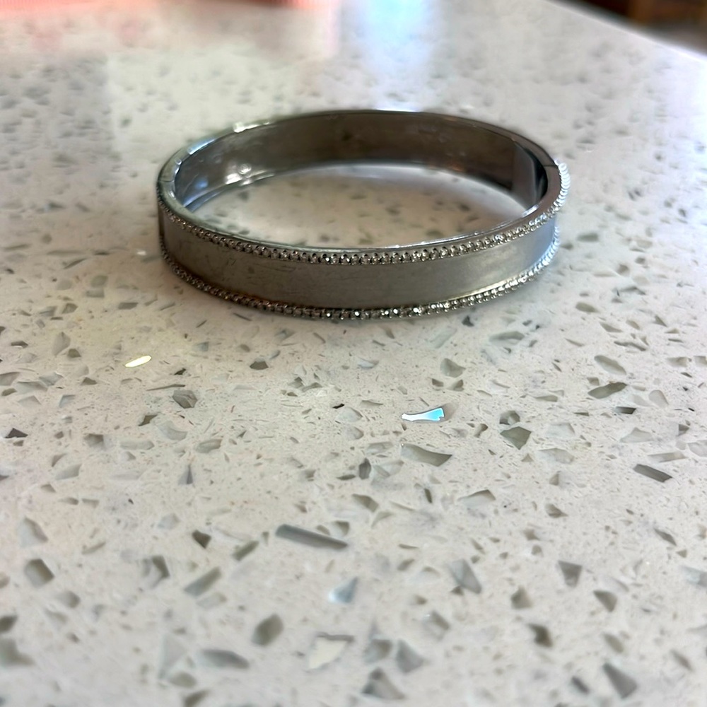 Sterling silver bangle with diamond border